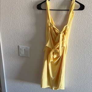 Yellow Sleeveless Dress with Bow Detail